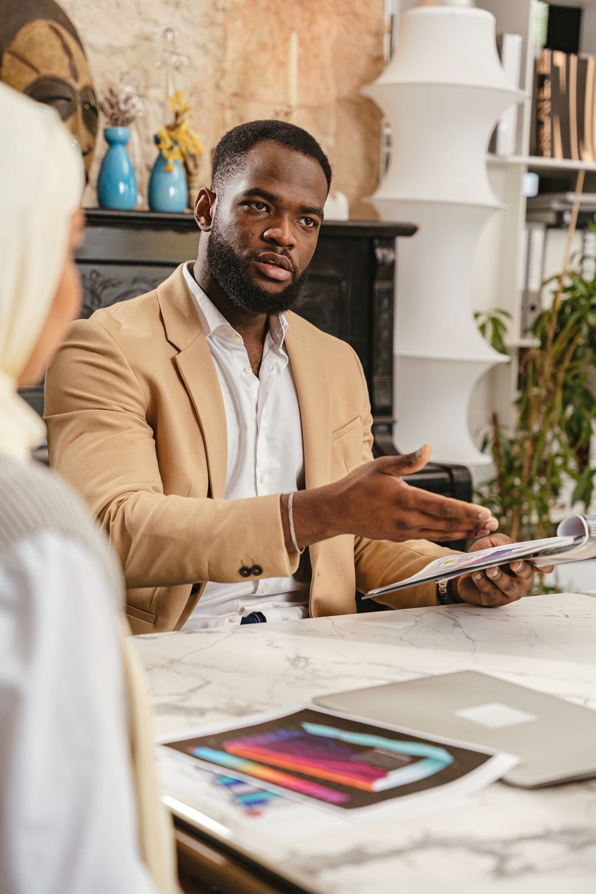 Advisor presenting a report to a client